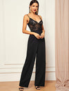 Jumpsuit de pierna recta con tirantes y cuerpo de encaje transparente